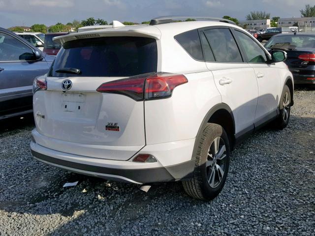 2T3WFREV1JW498630 - 2018 TOYOTA RAV4 ADVEN WHITE photo 4