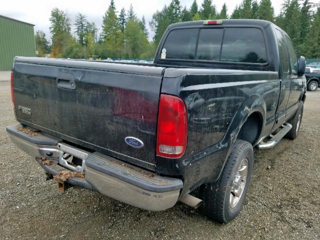 1FTSX31S11ED81819 - 2001 FORD F350 SRW S BLACK photo 4