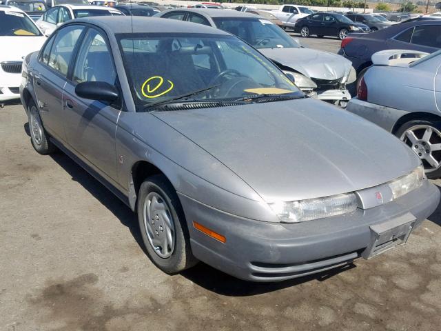 1G8ZF528XXZ101763 - 1999 SATURN SL SILVER photo 1