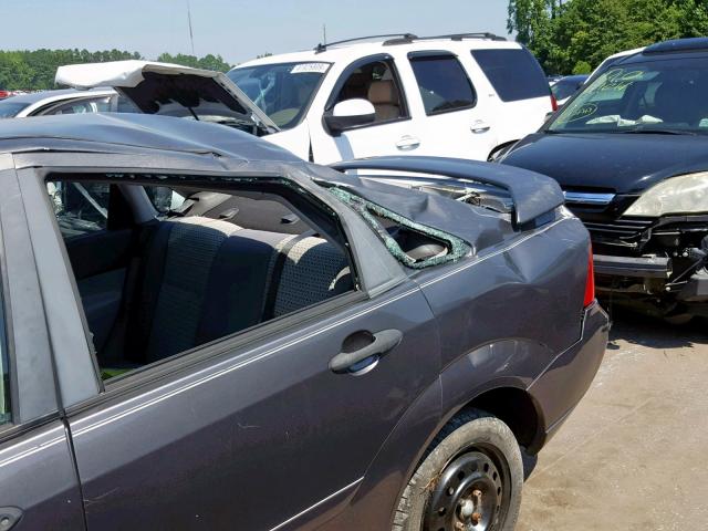 1FAHP34N77W244618 - 2007 FORD FOCUS ZX4 GRAY photo 9