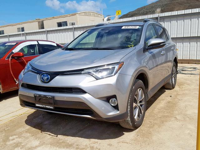 JTMRJREV1JD161805 - 2018 TOYOTA RAV4 HV LE SILVER photo 2