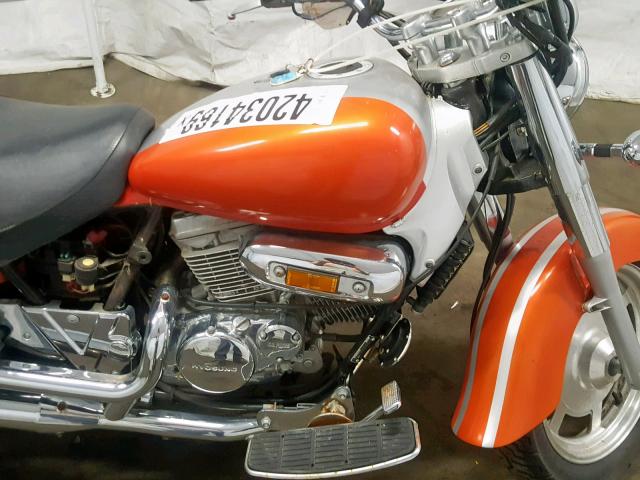 KM4MJ525341207662 - 2004 HYOSUNG GV250 ORANGE photo 7