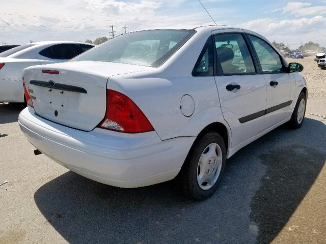 1FAFP33P71W183689 - 2001 FORD FOCUS LX WHITE photo 4