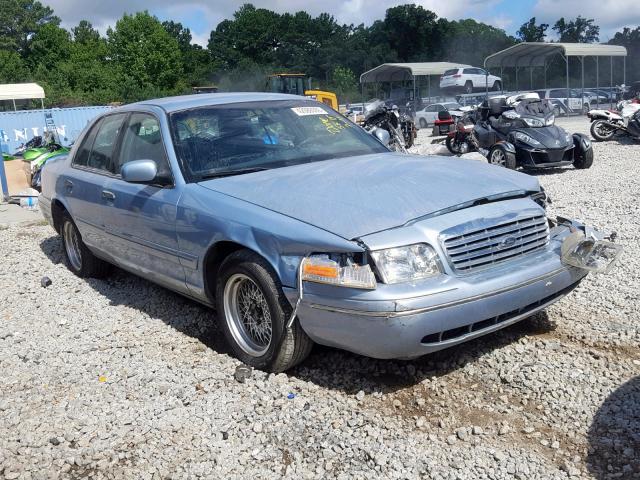 2FAFP74W4XX209773 - 1999 FORD CROWN VICT BLUE photo 1