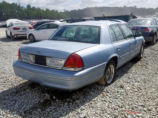 2FAFP74W4XX209773 - 1999 FORD CROWN VICT BLUE photo 4