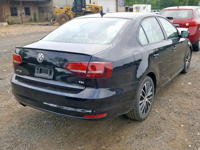 3VWD17AJ7GM218407 - 2016 VOLKSWAGEN JETTA SPOR BLACK photo 4