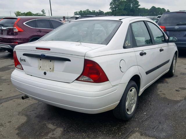 1FAFP33PX3W285040 - 2003 FORD FOCUS LX WHITE photo 4