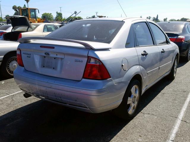 1FAHP34N75W203676 - 2005 FORD FOCUS ZX4 SILVER photo 4