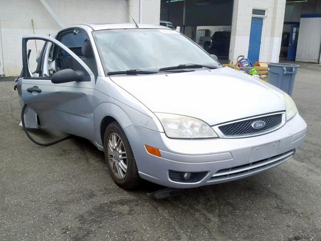 1FAHP34N67W227812 - 2007 FORD FOCUS ZX4 SILVER photo 1