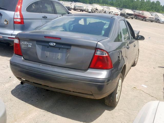 1FAFP34N77W256291 - 2007 FORD FOCUS ZX4 GRAY photo 4