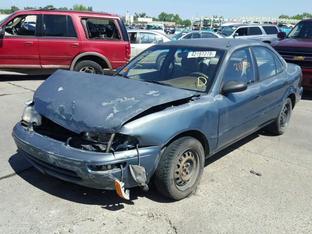 1Y1SK5286SZ064265 - 1995 GEO PRIZM LSI GREEN photo 2