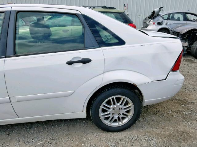 1FAFP34N07W272865 - 2007 FORD FOCUS ZX4 WHITE photo 9