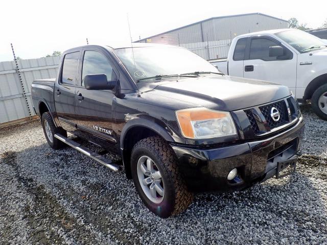 1N6AA0EC7BN317152 - 2011 NISSAN TITAN S BLACK photo 1