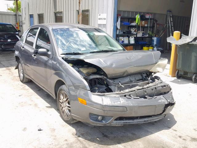 1FAHP34N07W198825 - 2007 FORD FOCUS ZX4 GRAY photo 1