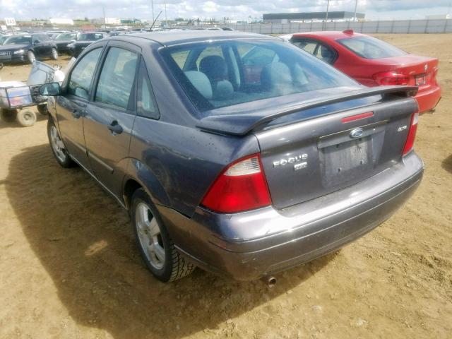 1FAFP34N06W240173 - 2006 FORD FOCUS ZX4 GRAY photo 3