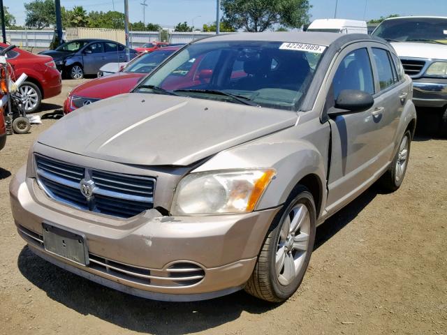 1B3CB4HA8AD605259 - 2010 DODGE CALIBER SX GOLD photo 2