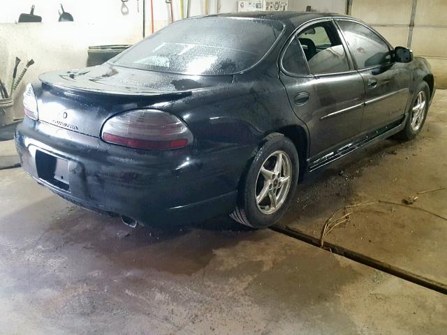 1G2WP52K62F138597 - 2002 PONTIAC GRAND PRIX BLACK photo 4