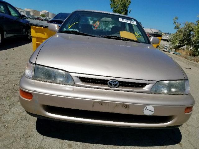 1NXBB02E7VZ635398 - 1997 TOYOTA COROLLA DX TAN photo 9