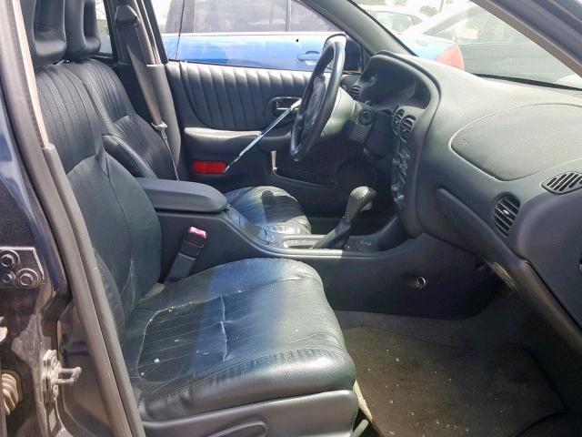 1G2WP52K82F223909 - 2002 PONTIAC GRAND PRIX BLUE photo 5