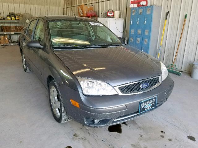 1FAHP34N97W356904 - 2007 FORD FOCUS ZX4 GRAY photo 1