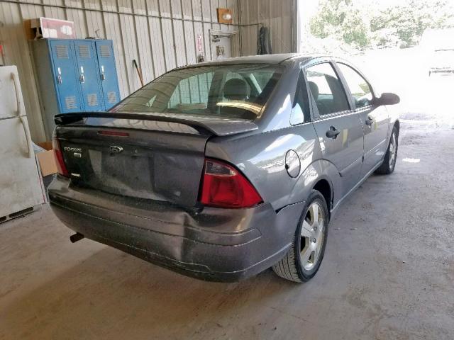 1FAHP34N97W356904 - 2007 FORD FOCUS ZX4 GRAY photo 4