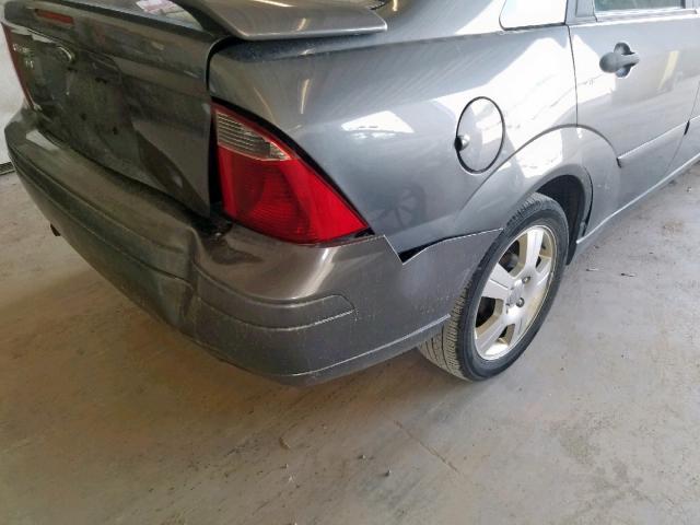 1FAHP34N97W356904 - 2007 FORD FOCUS ZX4 GRAY photo 9