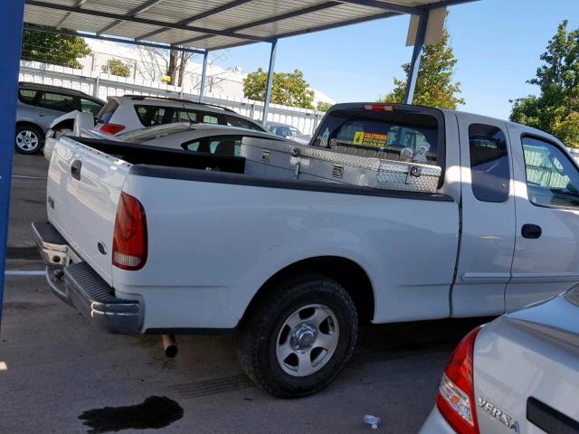 2FTRX17234CA22993 - 2004 FORD F-150 HERI WHITE photo 9