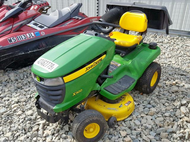 1M0X300CPDM265807 - 2000 JOHN DEERE 300B GREEN photo 2