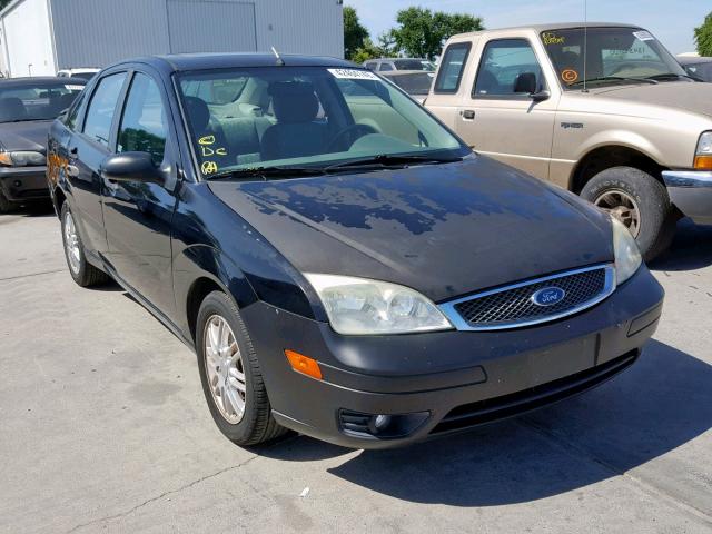 1FAFP34N45W264992 - 2005 FORD FOCUS ZX4 BLACK photo 1