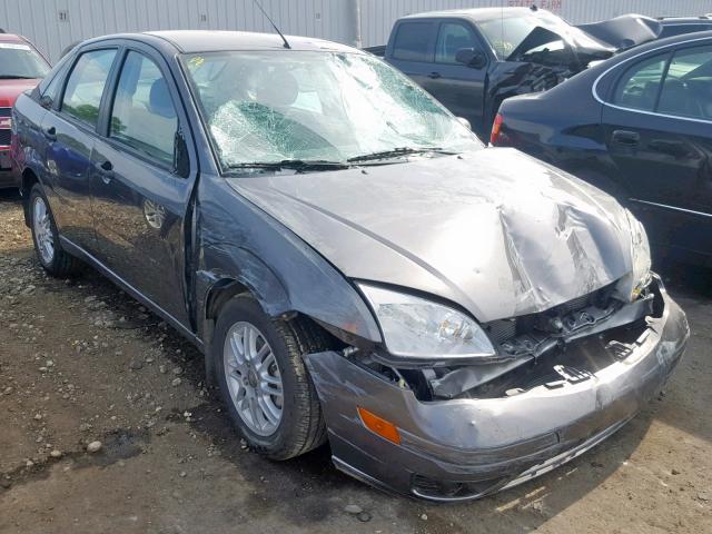 1FAFP34N85W137291 - 2005 FORD FOCUS ZX4 GRAY photo 1
