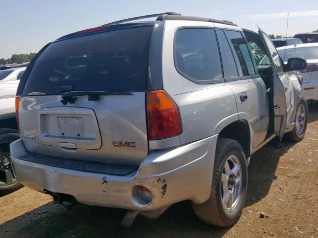 1GKDS13S572244082 - 2007 GMC ENVOY SILVER photo 4