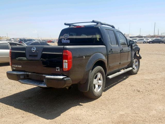 1N6AD07U86C473943 - 2006 NISSAN FRONTIER C BLACK photo 4