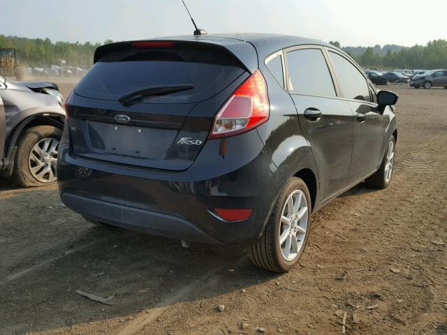 3FADP4EJ0HM130963 - 2017 FORD FIESTA SE BLACK photo 4