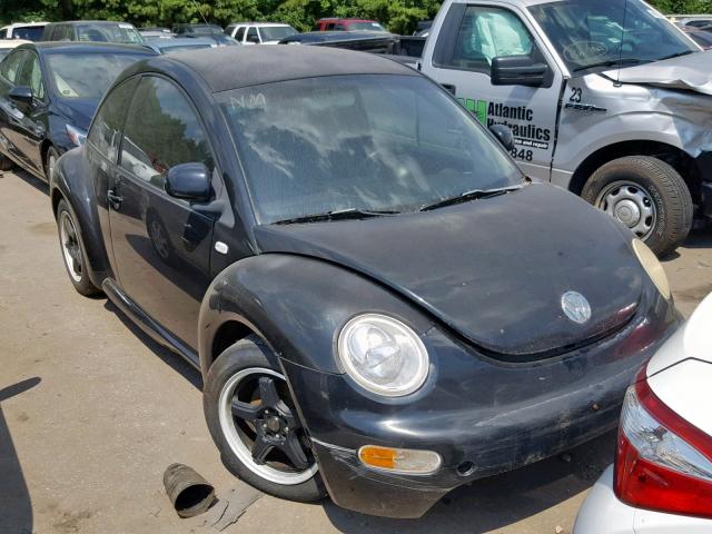 3VWCA21C0XM409103 - 1999 VOLKSWAGEN NEW BEETLE შავი ფოტო 1