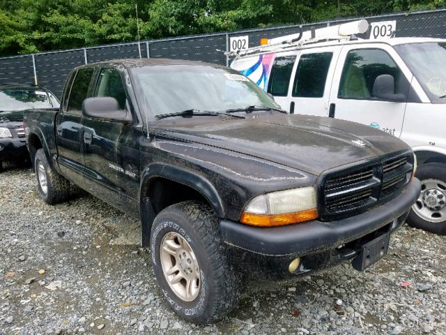 1B7HG38N12S615647 - 2002 DODGE DAKOTA QUA BLACK photo 1