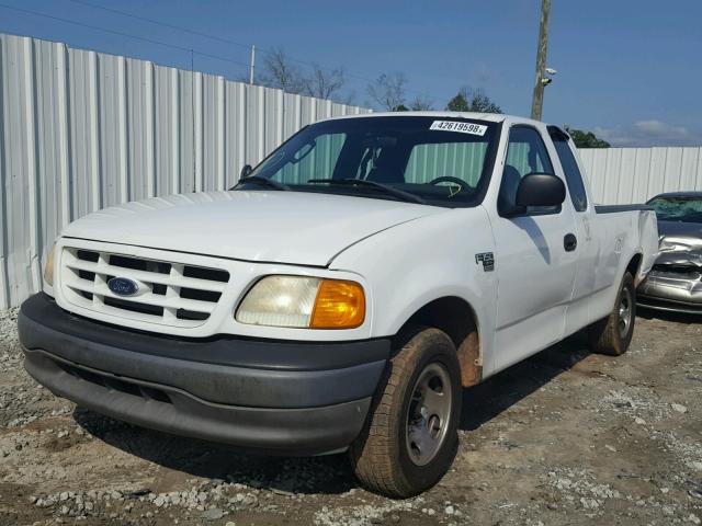 2FTRX17W24CA57401 - 2004 FORD F-150 HERI WHITE photo 2