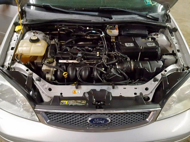 1FAFP34N87W330169 - 2007 FORD FOCUS ZX4 SILVER photo 7