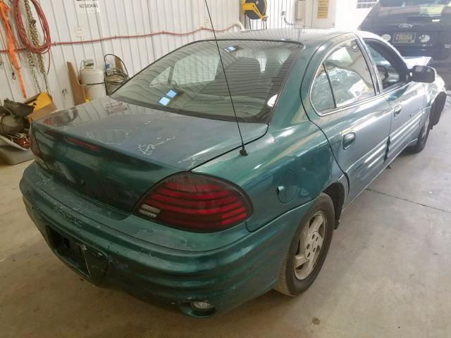 1G2NE52T7XC525677 - 1999 PONTIAC GRAND AM S GREEN photo 4