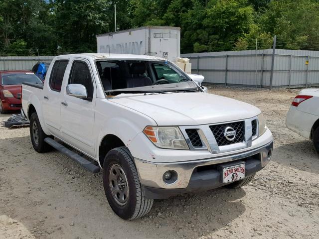 1N6AD07UX9C418348 - 2009 NISSAN FRONTIER C WHITE photo 1