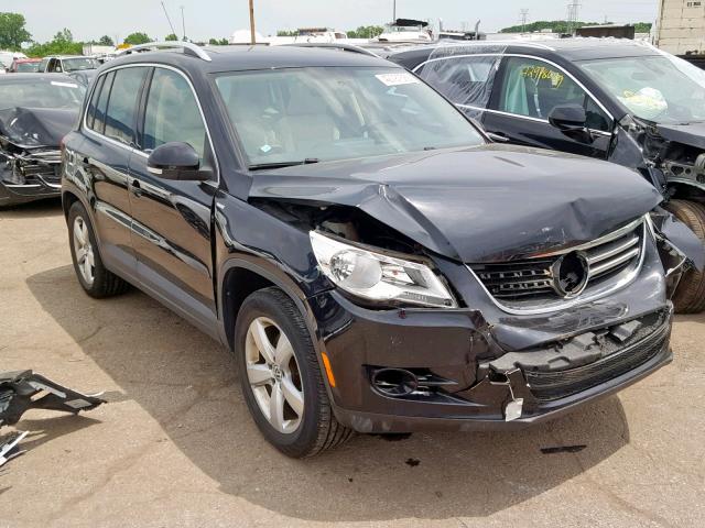 WVGBV7AX4AW514457 - 2010 VOLKSWAGEN TIGUAN SE BLACK photo 1