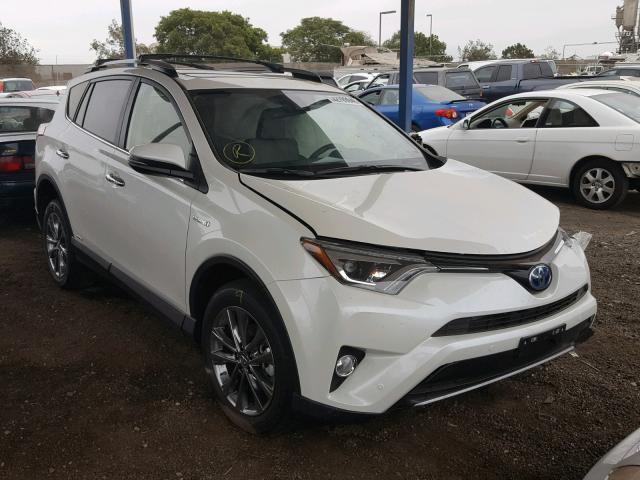 JTMDJREV0JD229330 - 2018 TOYOTA RAV4 HV LI WHITE photo 1