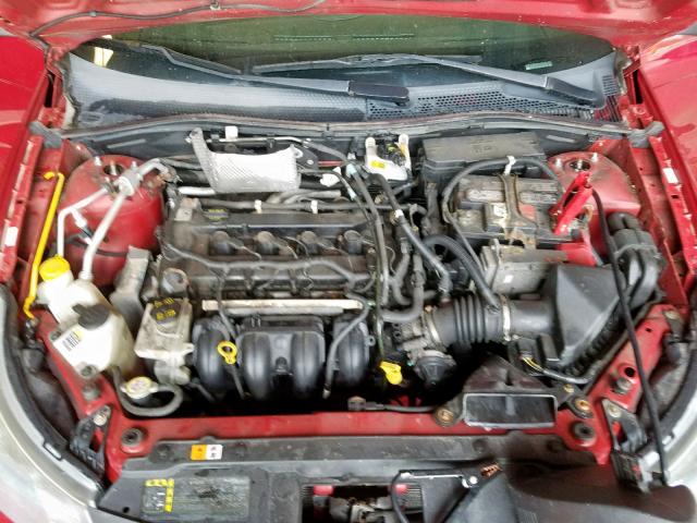 1FAHP33N79W154731 - 2009 FORD FOCUS SES RED photo 7