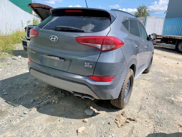 KM8J3CA25HU427509 - 2017 HYUNDAI TUCSON LIM GRAY photo 4