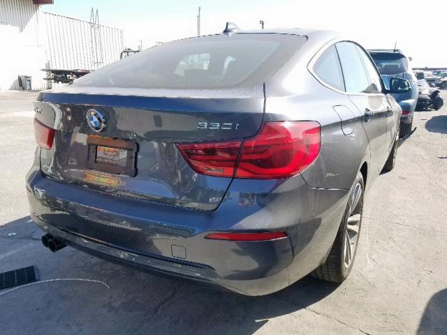 WBA8Z9C57JB220498 - 2018 BMW 330 XIGT GRAY photo 4