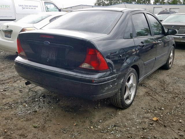 1FAFP33P03W331863 - 2003 FORD FOCUS LX BLACK photo 4