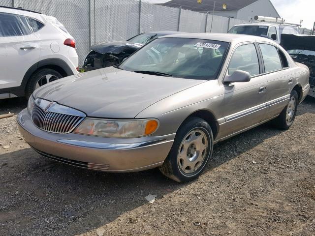 1LNHM97VXYY817109 - 2000 LINCOLN CONTINENTA GOLD photo 2