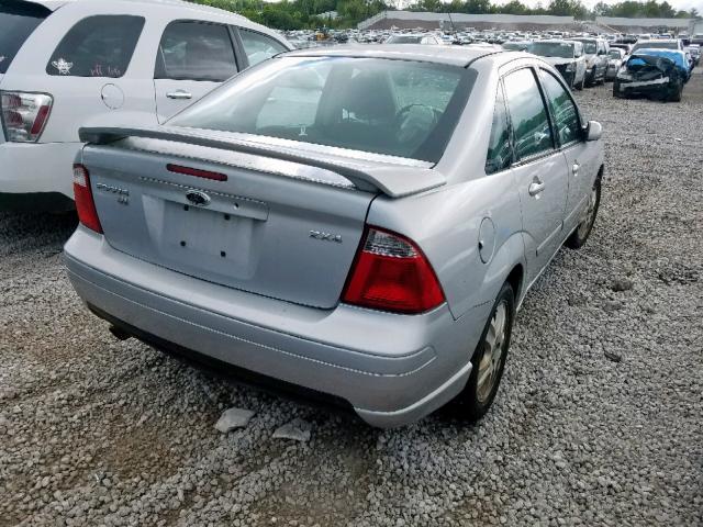 1FAFP38ZX6W176267 - 2006 FORD FOCUS ZX4 SILVER photo 4