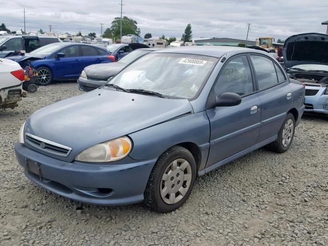 KNADC123726086412 - 2002 KIA RIO BLUE photo 2