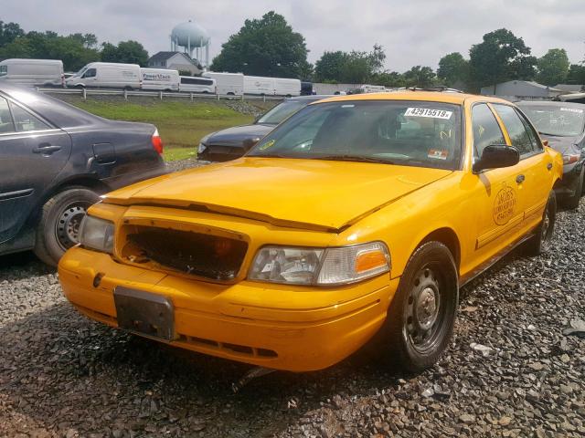 2FABP7AVXBX148173 - 2011 FORD CROWN VICT YELLOW photo 2