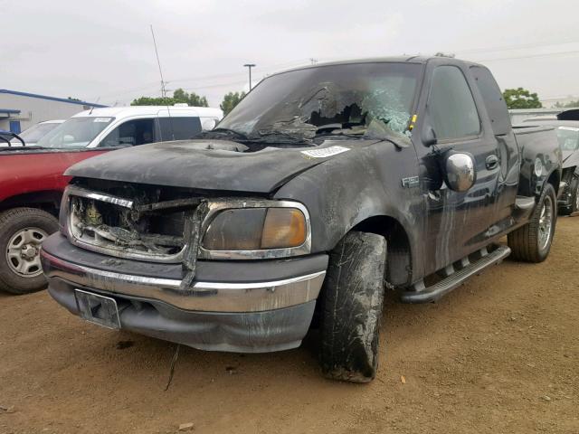 1FTZX0724XKA36220 - 1999 FORD F150 BLACK photo 2